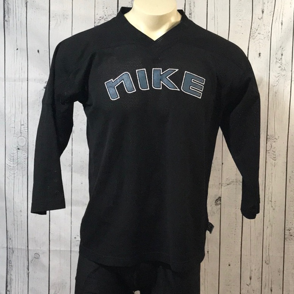 Nike long sleeve athletic top front logo mesh style fabric